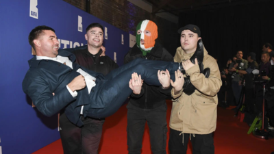 Members-of-the-Irish-hip-hop-group-Kneecap-will-be-investigated-by-UK-police-over-their-controversial-remarks.jpg