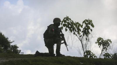 soldier-carries-out-an-anti-gang-operation-in-the-Kenscoff-neighborhood-of-Port-au-Prince-Haiti.jpg